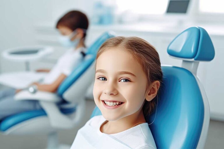 A dental hygienist cleaning an adult patient's teeth in a bright, modern dental office.